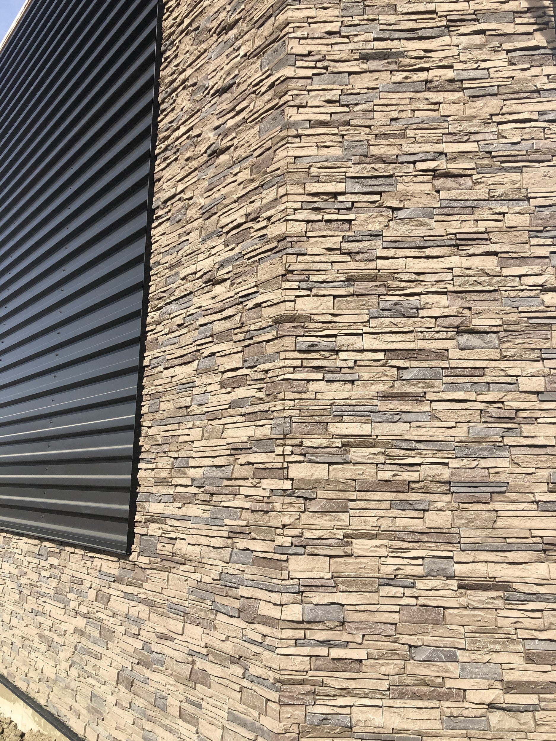Quality Stone faux Stacked Stone panel in Light Brown Blend — interlocking polyurethane wall panel, 2 sq ft per piece