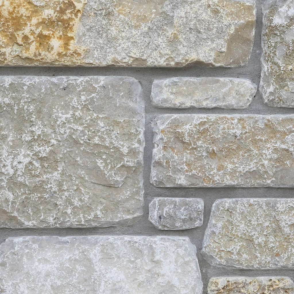 Brookhaven Ledge Blend Tumbled Dimensional natural limestone full bed building stone — Earthworks Lannon Blend Tumbled Dimensional