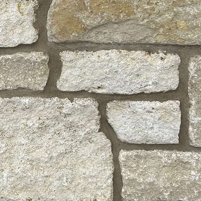 Coral Bluff Limestone Tumbled Random Heights natural limestone full bed building stone — Earthworks Castle Reef Tumbled Random Heights