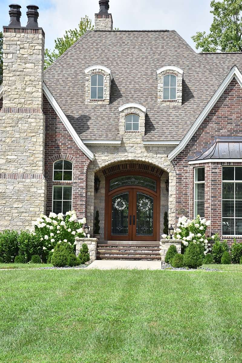Princeton Manor Limestone Tumbled Dimensional installed stone wall