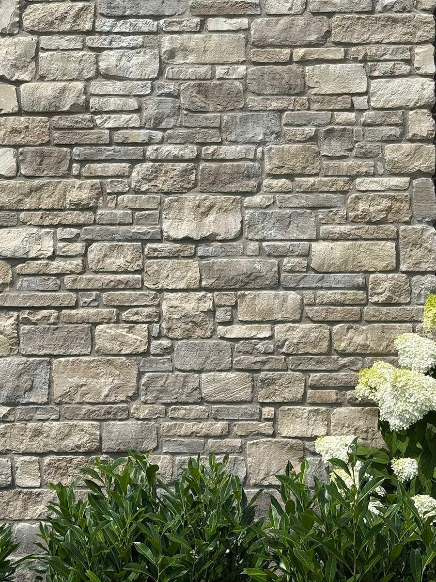 Princeton Manor Limestone Tumbled Dimensional installed stone wall