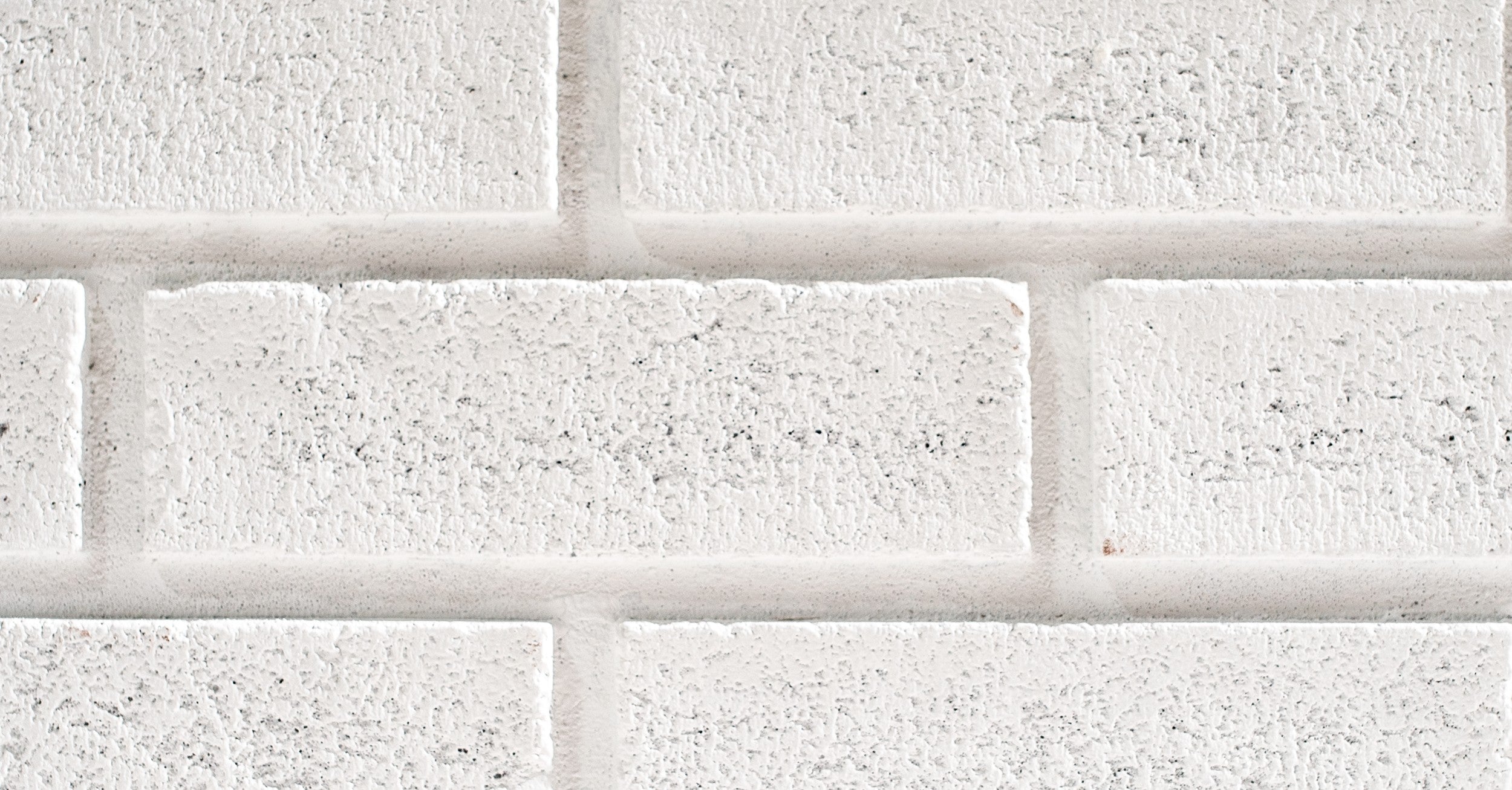 Quality Stone faux Thin Brick panel in Simply White — polyurethane brick veneer, 3.5 sq ft per piece