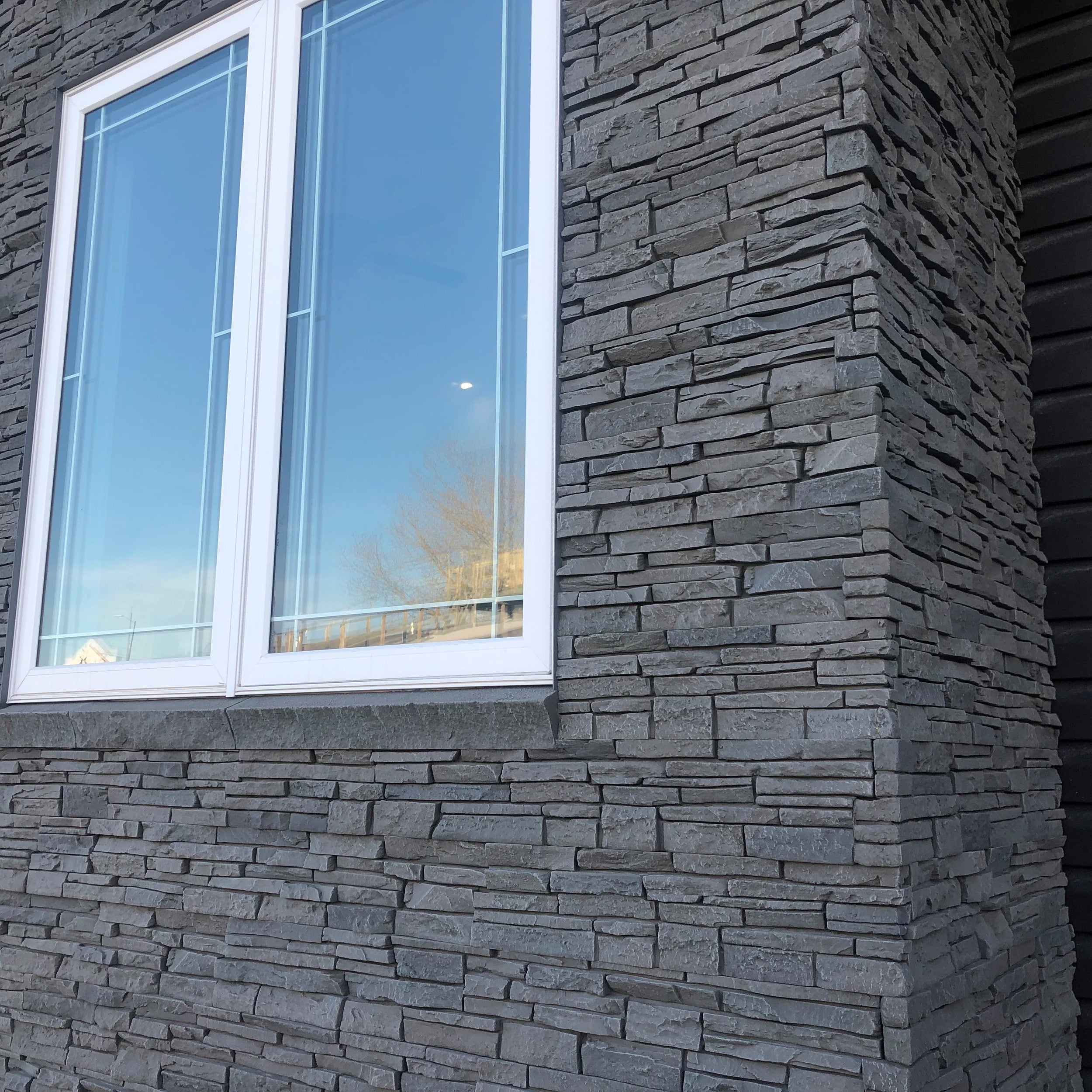 Quality Stone faux Stacked Stone panel in Grey Blend — interlocking polyurethane wall panel, 2 sq ft per piece
