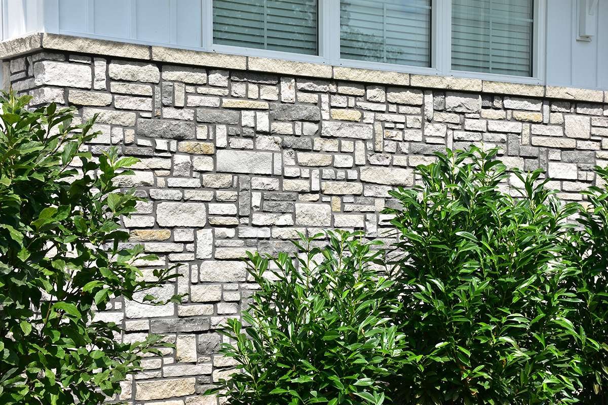 Vintage Hollow Limestone installed stone wall